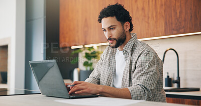 Buy stock photo Remote work, review or man in house with laptop, proofreading or novel editing in kitchen. Reading, wfh or author with tech, typing manuscript or literature chapter planning in story development.