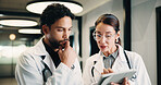 Medical, tablet and team of doctors thinking for advice, problem solving or medical solution. Hospital, tech and people with planning, digital results or decision for treatment in clinic hallway