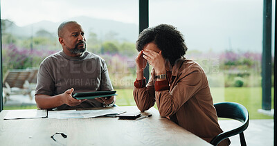 Buy stock photo Finance, couple and stress with tablet in home for debt overload, account arrears and inflation. Mature african people, tech and woman with financial anxiety for missed bills, expenses or overwhelmed