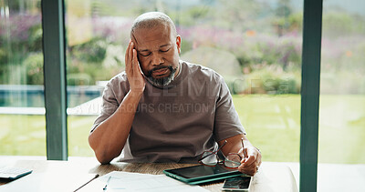 Buy stock photo Finance, man and glasses with headache in home for debt overload, budget stress or inflation. Mature black person, eyewear and migraine for financial anxiety, missed bills or overwhelmed for expenses