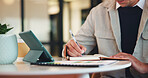 Notebook, tablet and hands of business man in office for research, investor review and planning. Trading broker, digital account and advisor with employee in agency for solution, report and writing