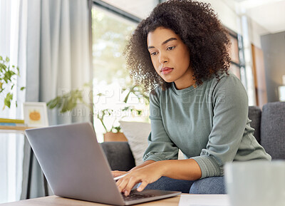 Buy stock photo Woman, relax and typing with laptop at house for research, finance report and expenses. African person, tech and email with documents, financial information and online payment for household bills