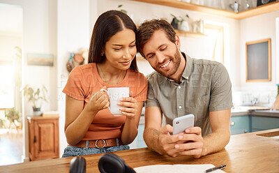 Buy stock photo Scroll, phone and coffee with couple in kitchen for social media post, reading and bonding. Online search, drinking tea and morning news with man and woman in home for connection, app and smile