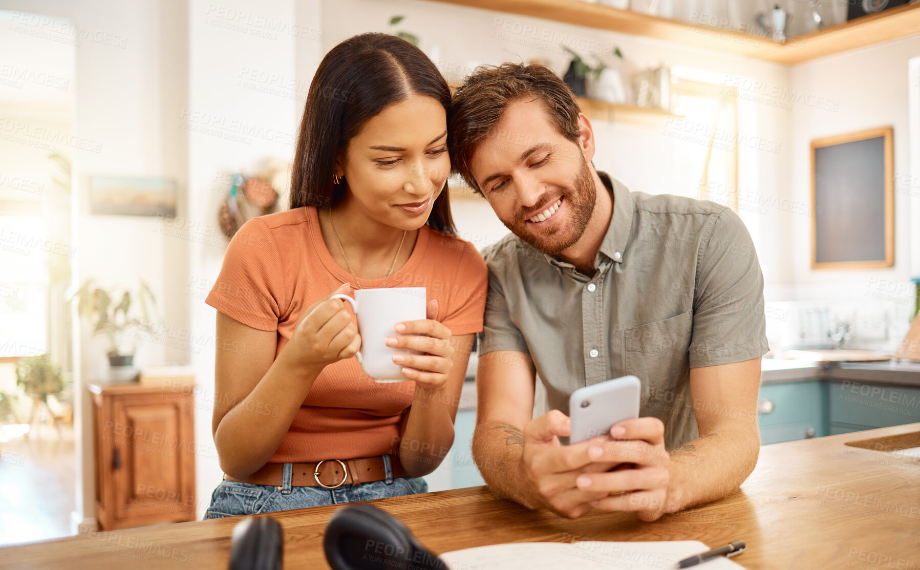 Buy stock photo Scroll, phone and coffee with couple in kitchen for social media post, reading and bonding. Online search, drinking tea and morning news with man and woman in home for connection, app and smile
