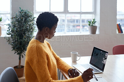 Buy stock photo Marketing, notes or black woman in office with laptop screen, planning or data research for pitch. Reading, tech or creative director with writing, trend review or media insight for brand proposal.