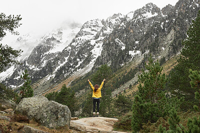 Buy stock photo Travel, mountains and person with back and arms up for success, achievement and summit. Celebration, wellness and hiker in nature for winter journey, adventure and exploration in forest and snow