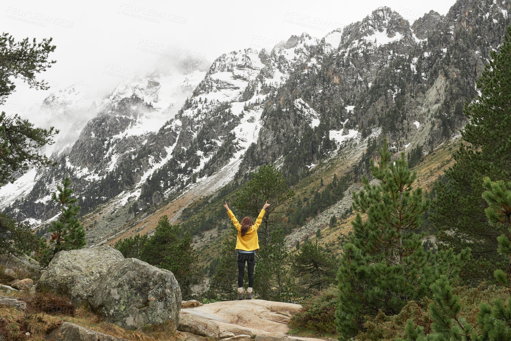 Buy stock photo Travel, mountains and person with back and arms up for success, achievement and summit. Celebration, wellness and hiker in nature for winter journey, adventure and exploration in forest and snow