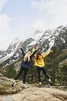 Travel adventure hiker girl friends arms outstreched enjoying beautiful nature landscape wanderlust