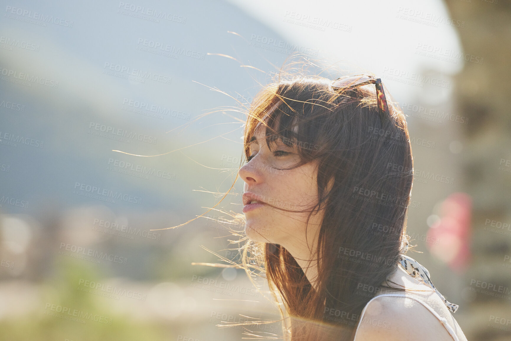 Buy stock photo Travel, thinking and woman outdoor with wind for adventure, view and sightseeing on vacation. Holiday, reflection and person in nature for tourism, mindset and space for exploration with memory
