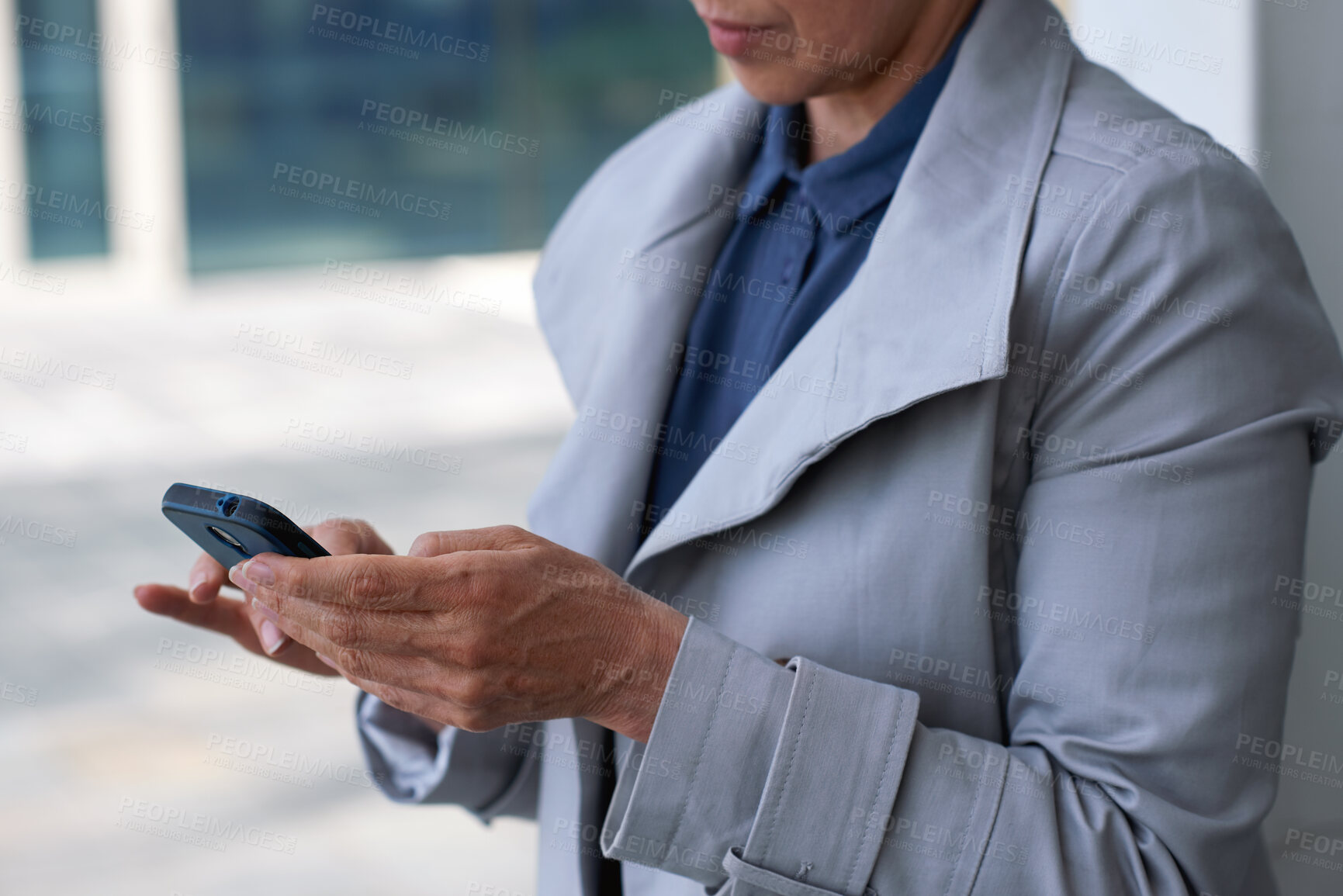 Buy stock photo Businesswoman, hands and typing in city with phone, check work schedule and app for email notification. Person, scroll and browsing in urban town with tech, text message and online calendar for job.