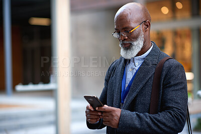 Buy stock photo Businessman, commute and outdoor in city with phone, check schedule and email notification for work. Mature, black person and browsing in urban town with tech, online calendar and travel for job.