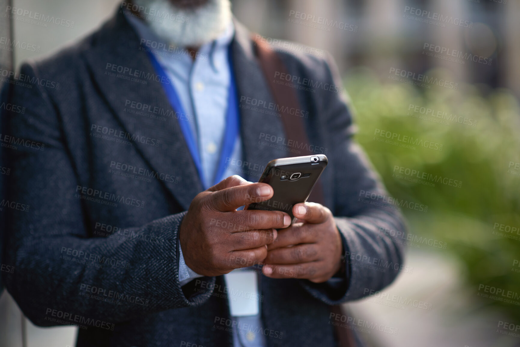 Buy stock photo Business, texting or hands in city with phone, agenda change or online chat in morning commute. Space, man or employee in town with tech, schedule review or email communication at start of day.