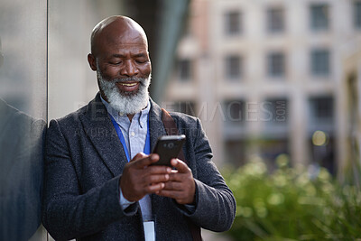 Buy stock photo Mature, cellphone and business man in city for work commute, communication and travel with smile. Black person, tech and message or typing for online contact for feedback, network or outdoor