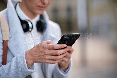 Buy stock photo Businesswoman, hands and commute in city with phone, typing text message or email notification for work. Space, person and browse outdoor in urban town with tech, social media post or travel for job.