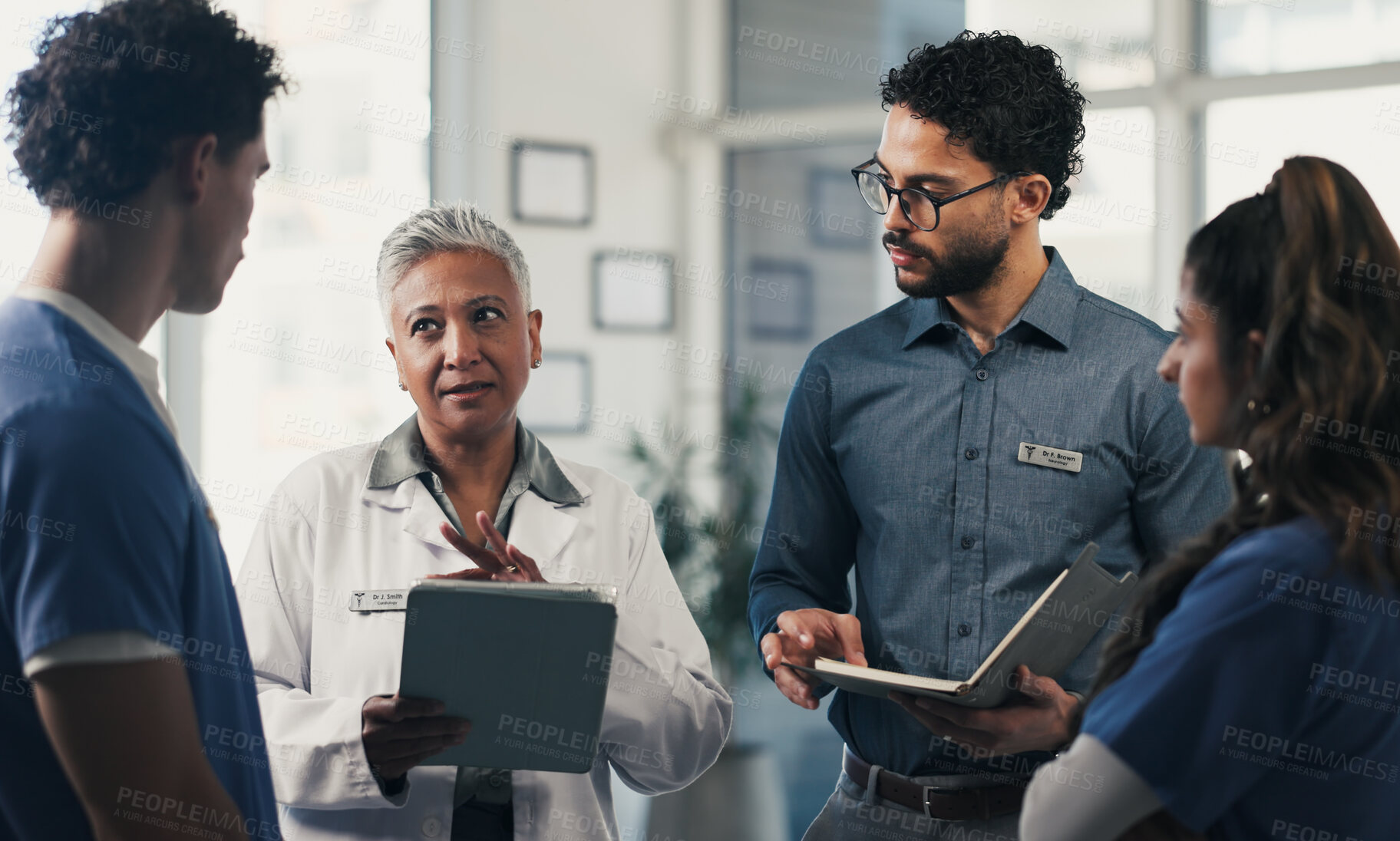 Buy stock photo Medical, discussion or people in hospital with tablet, group insight or patient review for treatment plan. Healthcare, meeting or doctors with tech, teamwork or director feedback in post surgery.