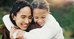Smile, nature and child hugging mother in park for bonding, love and family on holiday together. Happy, outdoor and girl kid embracing mom for connection, safety or support on weekend in garden.