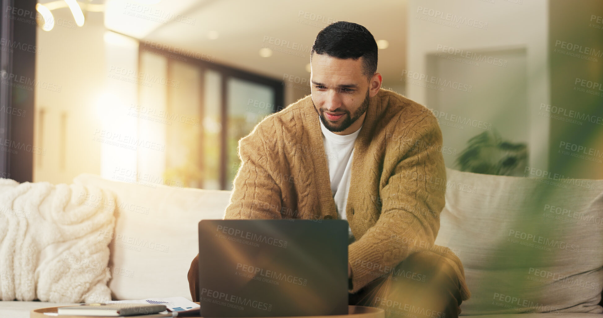 Buy stock photo Man, laptop and happy for remote work in home lounge with internet connection, network or research. Digital marketing, promoting and male freelancer with technology for social media interaction
