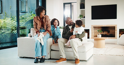 Buy stock photo Family, love and parents with children in home, happy and relax with girls on weekend or connection. African people, together and bonding with kids, mom and dad with smile for baby in living room