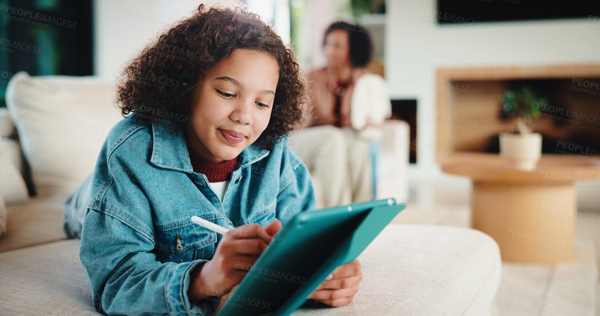 Buy stock photo Tablet, relax and kid writing in home for educational game, elearning or knowledge development. Tech, pen and girl on sofa with internet notes, homework research or online course in family house