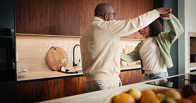 Buy stock photo Father, child and dance in kitchen for love, happiness and family connection with daughter. African dad, girl and holding hands with music, rhythm and bonding together on weekend break in house