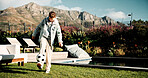 Football, ball and kick with child outdoor for playing, playoff practice and game drills. Soccer sport, match training and weekend break with kid in backyard of home for growth, fun and footwork