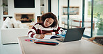 Laptop, elearning and child with homework in house for online class with studying for education. Writing, technology and girl student with computer for virtual lesson with notes or quiz in house.