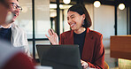 Laptop, night and team with happy woman for project discussion, funny joke or tasks in office. Female person, employee or laughing with group on computer in late evening for business humor or comedy