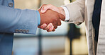 Handshake, meeting and business people with greeting for partnership, deal or agreement together. Employees, colleagues or shaking hands with b2b for introduction, confirmation or teamwork in office