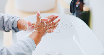 Buy stock photo Child, soap and washing hands in bathroom for cleaning, hygiene practice and dirt removal in home. Kid, foam and sanitising at basin for protection, healthy habit and cleansing skin for wellness