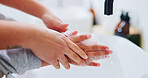 Parent, child and soap in bathroom for washing hands, cleaning and teaching hygiene in home. Family wellness, helping kid and foam at basin for learning, guidance or germ prevention for sanitation