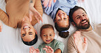Portrait, relax and smile with family on bed in home for bonding or weekend from above. Affection, morning or wave with father, happy children and mother in apartment for safety, security or trust