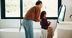 Hair care, mother and child with mirror in bathroom, grooming help and morning routine for bonding. Support, love and woman with girl for getting ready, check hairstyle and happiness in family home