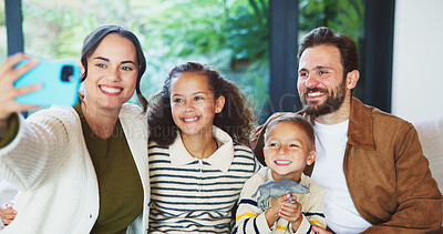 Buy stock photo Hug, selfie and home with happy family for picture, capture moment or bonding together. Mom, dad and children with smile, holiday or weekend for photography, memory or social media post in house