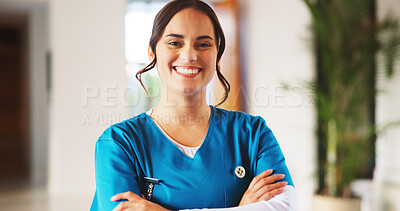 Buy stock photo Woman, nurse and arms crossed with smile at clinic, portrait and confidence with healthcare services. Person, medical professional and happy with pride in hallway for wellness at hospital in Portugal
