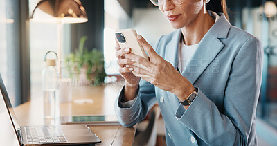 Buy stock photo Businesswoman, online and hands with phone in cafe, communication and reading email on social media. Restaurant, remote work and person with mobile for digital chat, scroll and networking on website