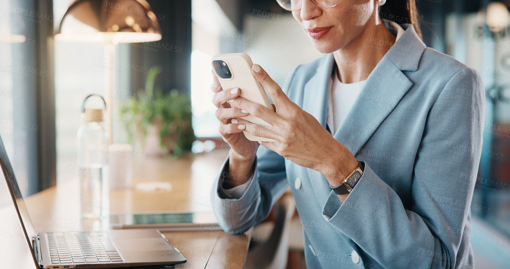 Buy stock photo Businesswoman, online and hands with phone in cafe, communication and reading email on social media. Restaurant, remote work and person with mobile for digital chat, scroll and networking on website