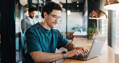 Buy stock photo Man, typing and remote work in cafe with laptop, online research and check trends for graphic design. Freelancer, person or designer browsing in restaurant with computer, editing project or campaign.
