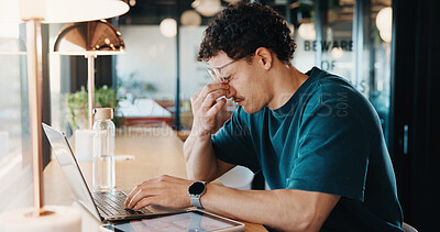 Buy stock photo Remote work, eye strain and man in cafe with glasses, burnout or pressure with headache. Tired, migraine pain and freelancer in bistro with laptop, vision discomfort or sore head with dizziness.