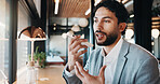 Businessman, cafe and speaker with phone for communication, discussion or conversation. Man, employee or consultant talking with mobile smartphone for chat, audio message or sound app in coffee shop