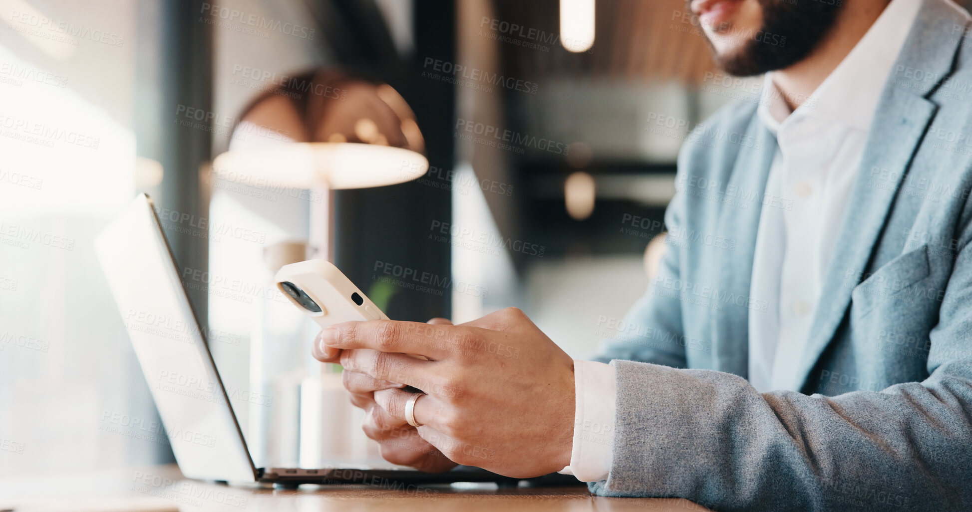 Buy stock photo Laptop, phone and hands of man in cafe for remote work, communication or planning. Tech, search and freelancer with typing email, online schedule or reading info on mobile app for task in coffee shop