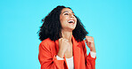 Winner, success and business woman with fist pump in studio for celebration or winning. Promotion, excited and happy person for lottery, competition or prize for good news or bonus on blue background