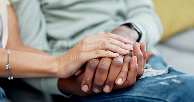 Buy stock photo Couple, holding hands and closeup on sofa with bonding, love and connection with care in living room. People, partnership and relationship with trust, loyalty and relax on couch in lounge at house