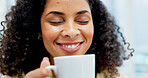 Happy, smell and woman with coffee cup in home, caffeine aroma and hot beverage for morning routine. Smile, apartment and female person with tea scent for weekend peace, energy boost and start of day