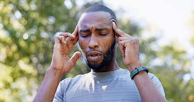 Buy stock photo Fitness, runner and black man with headache in nature for pressure, strain and brain fog for health. Sports, exercise and person with head pain for challenge, active hobby and training outdoor