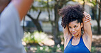 Exercise, outdoor and woman stretching with personal trainer for cardio, workout or training. Sports, health and female athlete with coach and arm warm up for fitness or muscle flexibility in park