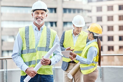 Buy stock photo Portrait, teamwork and man in city, architecture and planning for renovation, smile or career ambition. Outdoor, engineering or mature person with blueprints, collaboration or maintenance in New York