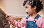 Focused on learning her alphabet