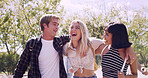 Laugh, people and college students in park on campus for course, opportunity and confidence. Walk, study and happy friends in nature with pride for university, education and scholarship or admission