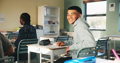 Buy stock photo Classroom, education and boy in high school with smile for academic development, growth or future. Portrait, happy teenager and student at academy for lesson, scholarship and learning with classmates