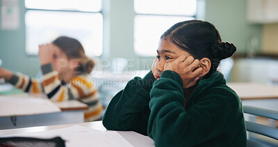 Buy stock photo Bored, learning and child thinking in classroom for course, development and knowledge at school. Tired, kid and girl in elementary for education with reflection, idea or distracted student at lesson